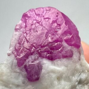 27 Carat Terminated Fluorescent Ruby Crystal Specimen With Hematite From Jegdalek Afghanistan