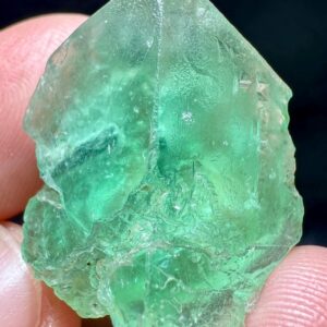 64 Carat Fluorescent Phosphorescent Green Fluorite Crystal With Black Tourmaline From Gilgit Pakistan