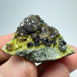 77 Carat Green Vesuvianite Crystal with Andradite Garnet & Biotite Mica - Afghanistan