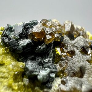47 Carat Green Vesuvianite Crystal With Andradite Garnet & Biotite Mica From Afghanistan