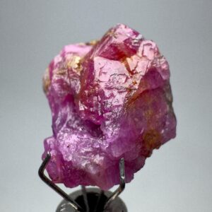 12.70 Carat Terminated Fluorescent Ruby Crystal From Jigdalok Afghanistan