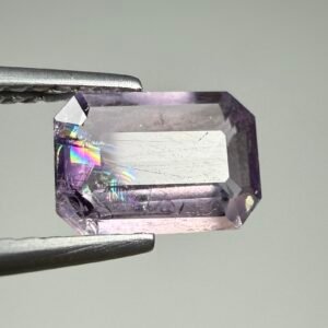 0.95 CT Faceted Fluorescent Scapolite Gemstone From Afghanistan